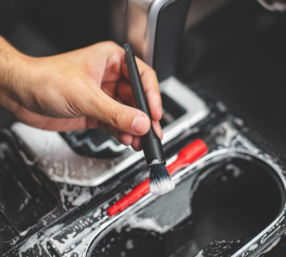 Detailing Mini Brush Set in Use to clean car interior