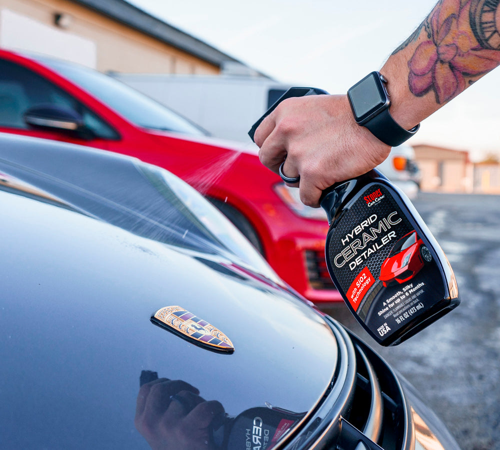 
                  
                    Stoner Hybrid Ceramic Detailer in use to clean the front of a car
                  
                